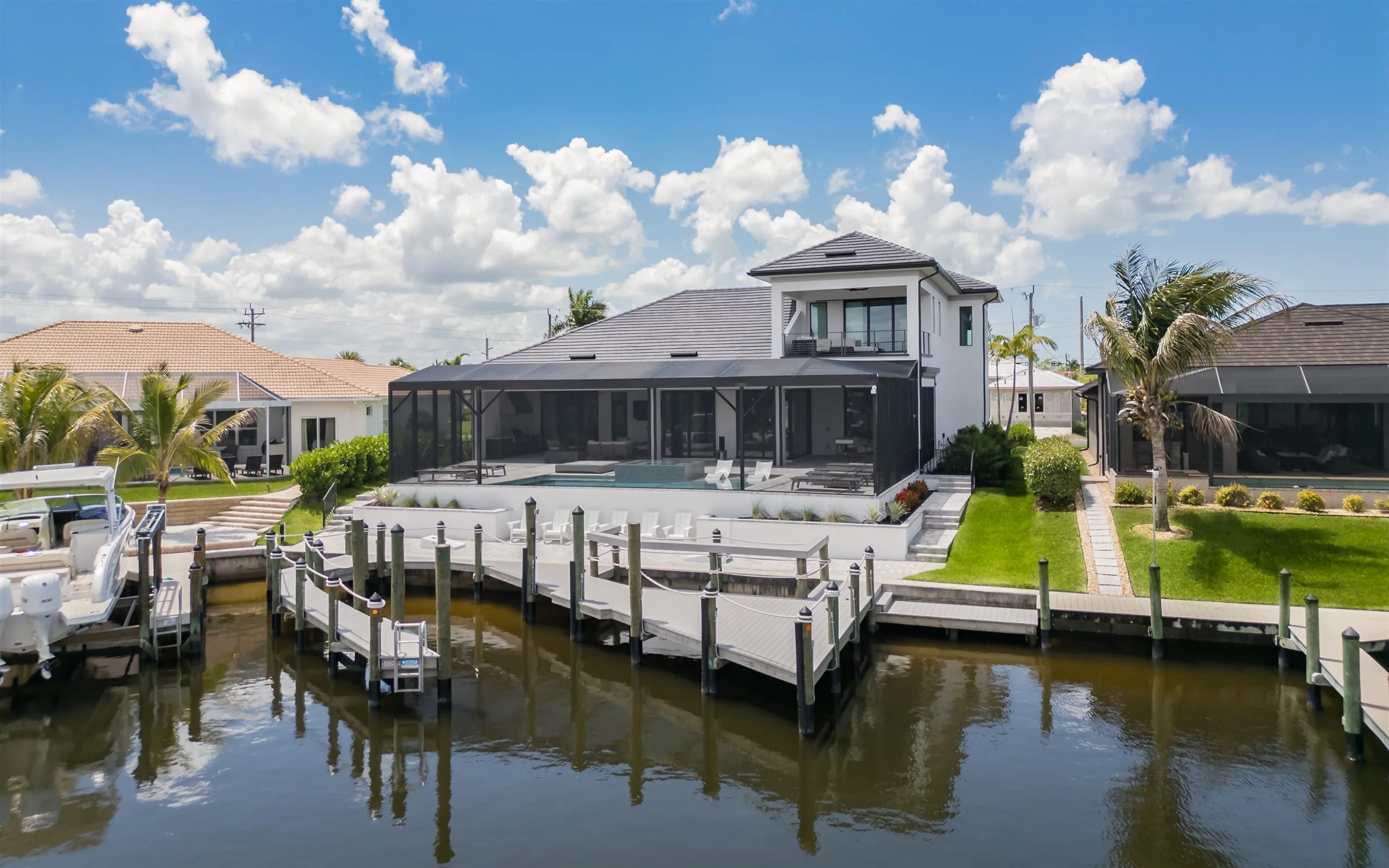 The home and private dock seen from across the canal