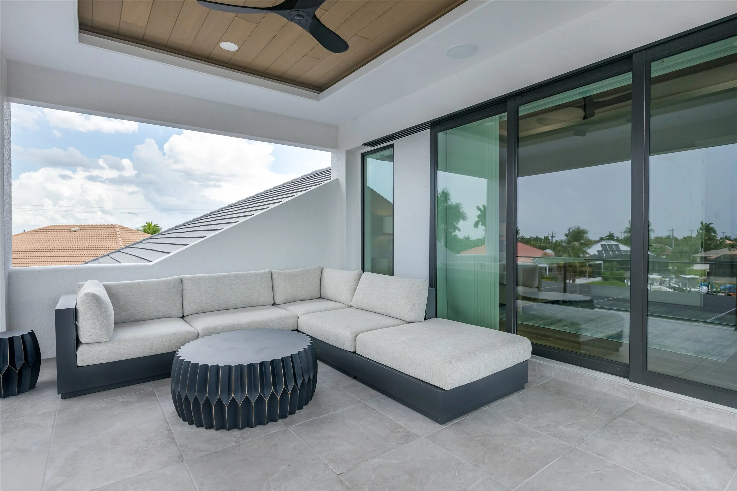 Upper lanai lounge seating at dusk