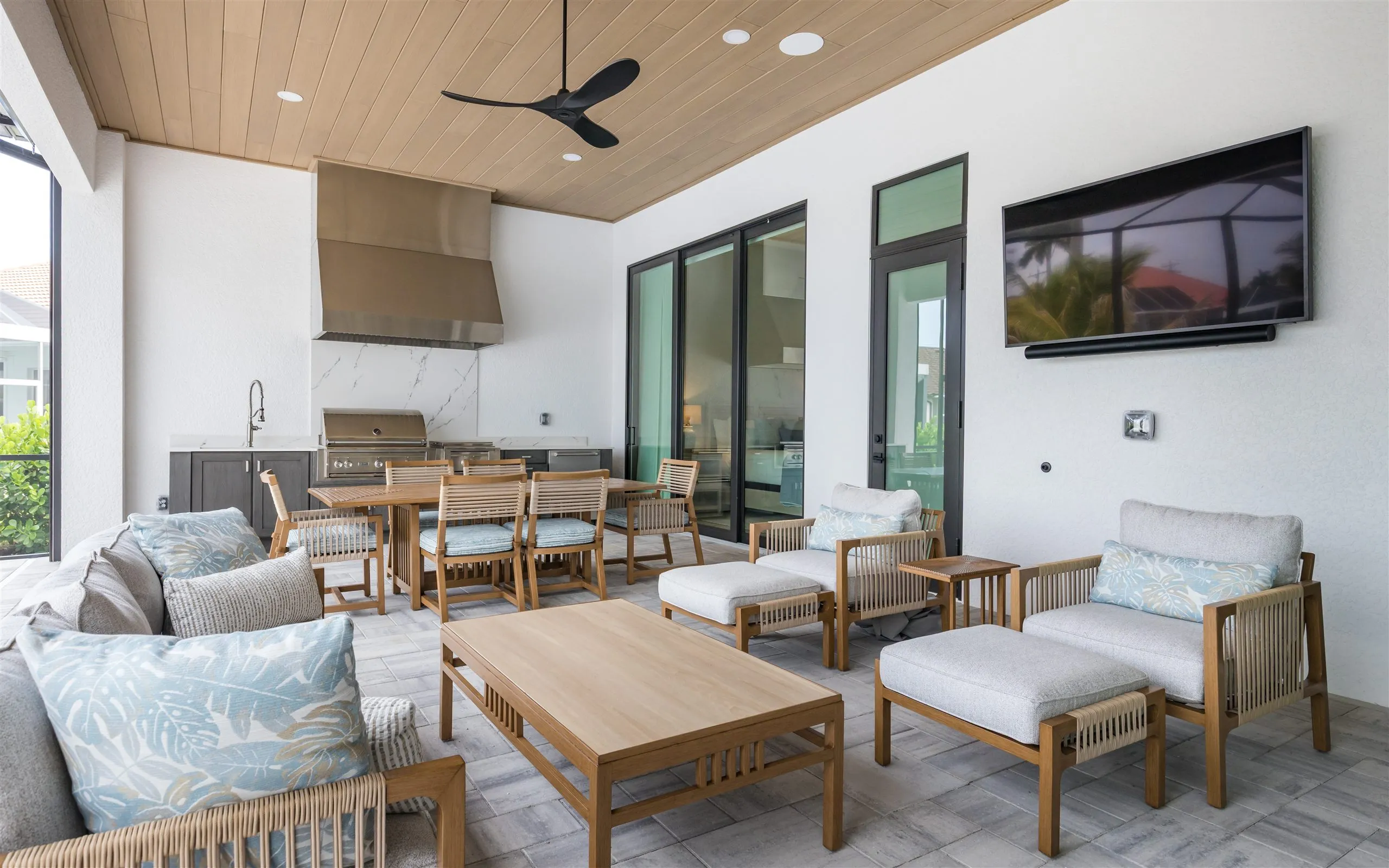 Covered lanai lounge seating at Villa Sauvage